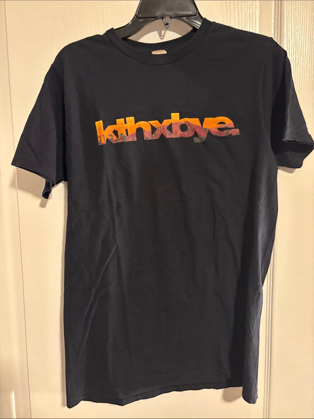 Coachella Black Tee with Repeated Logo Tag
